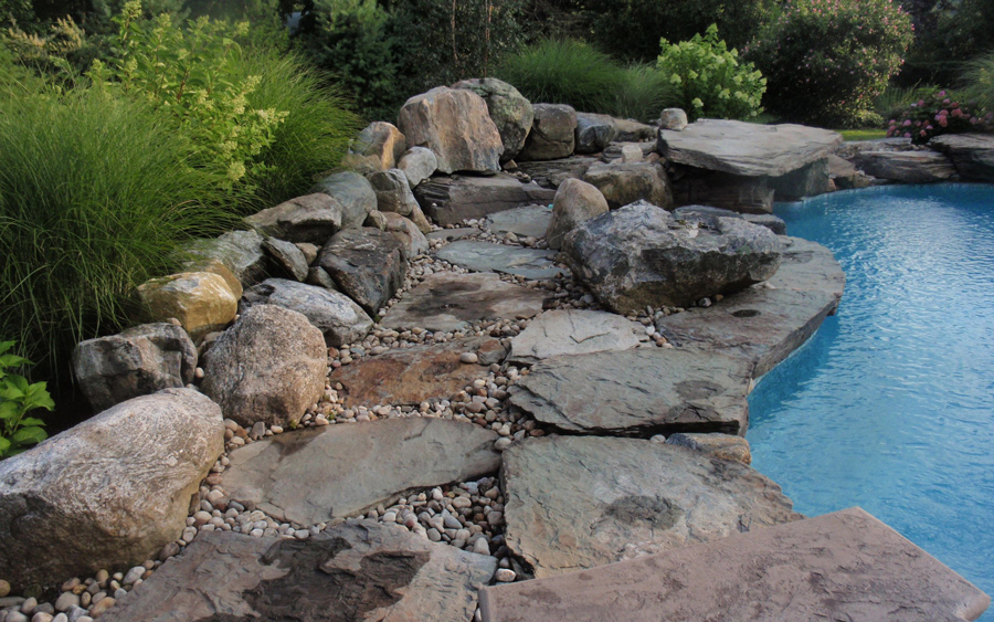 Stepping stone connection between outdoor spaces on a residential property